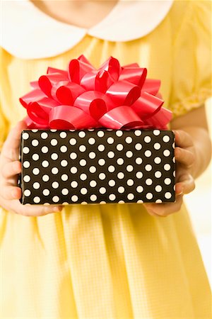 polka dot gift wrap - Girl Holding a Present Stock Photo - Rights-Managed, Code: 700-00592014