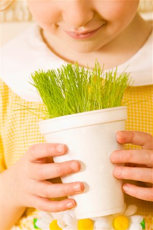 simsearch:700-01716701,k - Girl Holding Cup of Grass Stock Photo - Rights-Managed, Code: 700-00592011