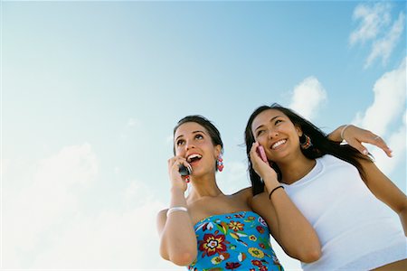 simsearch:700-00606683,k - Teenagers Using Cellular Telephones Stock Photo - Rights-Managed, Code: 700-00592434