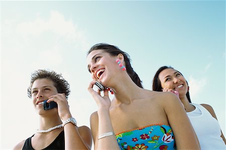 simsearch:700-00606683,k - Teenagers Using Cellular Telephones Stock Photo - Rights-Managed, Code: 700-00592433