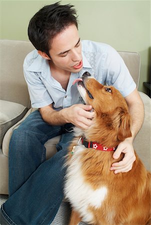 simsearch:700-00897631,k - Young Man Talking To Dog Stock Photo - Rights-Managed, Code: 700-00592746