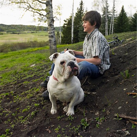 simsearch:700-06570975,k - Portrait of A Bulldog and Boy Stock Photo - Rights-Managed, Code: 700-00593042