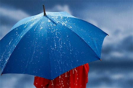 simsearch:700-00177533,k - Person Holding Umbrella Stock Photo - Rights-Managed, Code: 700-00605139