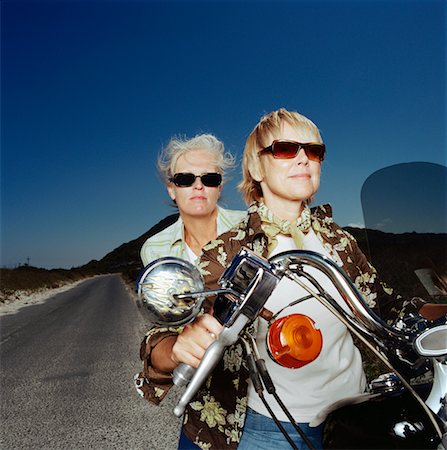 simsearch:614-06896253,k - Two Women Riding Motorcycle Stock Photo - Rights-Managed, Code: 700-00606356