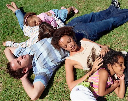 simsearch:600-01614282,k - Family Lying Down on the Grass Stock Photo - Rights-Managed, Code: 700-00606694
