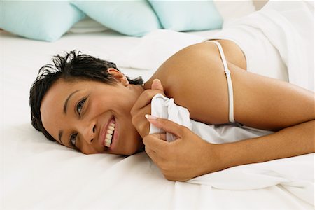 simsearch:700-00606802,k - Woman Lying on Bed Stock Photo - Rights-Managed, Code: 700-00606799