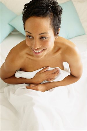 simsearch:700-00606802,k - Woman Sitting in Bed Stock Photo - Rights-Managed, Code: 700-00606807
