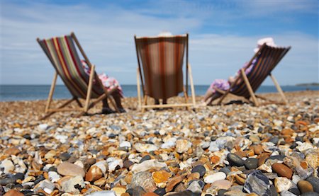 simsearch:700-01163568,k - Women Sitting on Beach Chairs Stock Photo - Rights-Managed, Code: 700-00606959