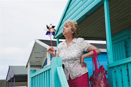 Woman on Porch of Beach Hut Stock Photo - Rights-Managed, Code: 700-00606951