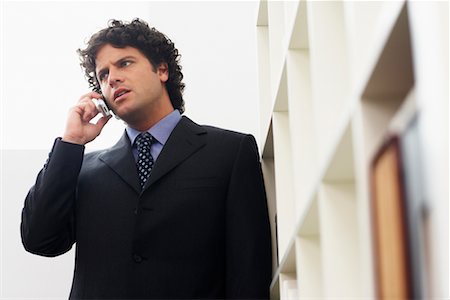 simsearch:700-00695760,k - Businessman Using Cell Phone Stock Photo - Rights-Managed, Code: 700-00607792