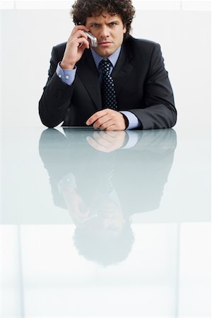 simsearch:700-00695760,k - Businessman Using Cell Phone Stock Photo - Rights-Managed, Code: 700-00607821
