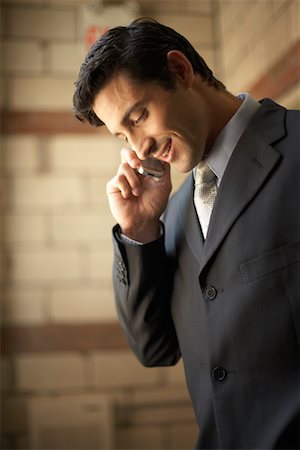 simsearch:700-00163379,k - Businessman Using Cellular Telephone Stock Photo - Rights-Managed, Code: 700-00607847