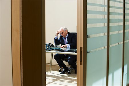 simsearch:6109-08203934,k - Businessman in Private Office Stock Photo - Rights-Managed, Code: 700-00608441