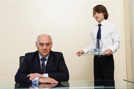 simsearch:700-03621329,k - Assistant Holding Tray, Standing beside Boss Stock Photo - Rights-Managed, Code: 700-00608459