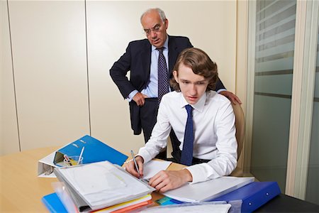 simsearch:600-01613965,k - Boss Watching Young Businessman Working Stock Photo - Rights-Managed, Code: 700-00608462