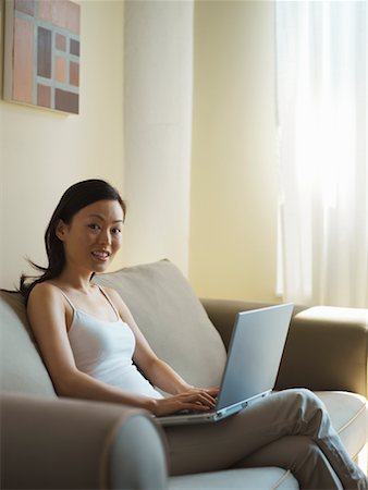 simsearch:700-00083403,k - Portrait of Woman Using Laptop Stock Photo - Rights-Managed, Code: 700-00608821