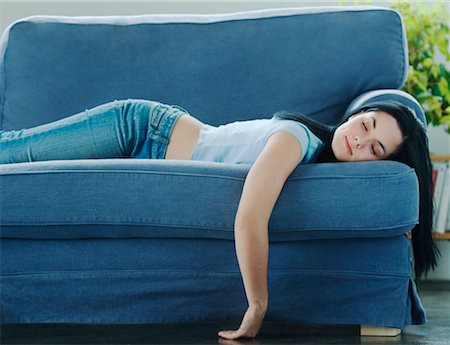 simsearch:700-00522867,k - Woman Lying Down on Sofa Stock Photo - Rights-Managed, Code: 700-00608978