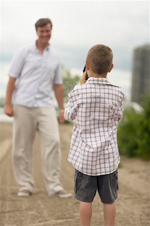 simsearch:700-00069467,k - Father and Son Taking Pictures Stock Photo - Rights-Managed, Code: 700-00609058