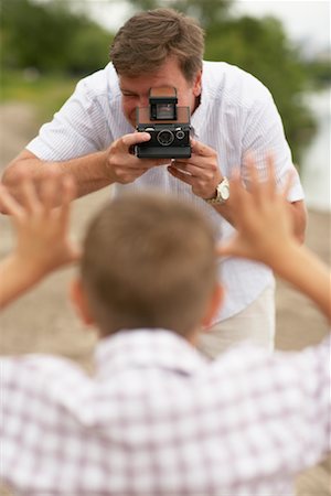 simsearch:700-00069467,k - Father and Son Taking Pictures Stock Photo - Rights-Managed, Code: 700-00609064