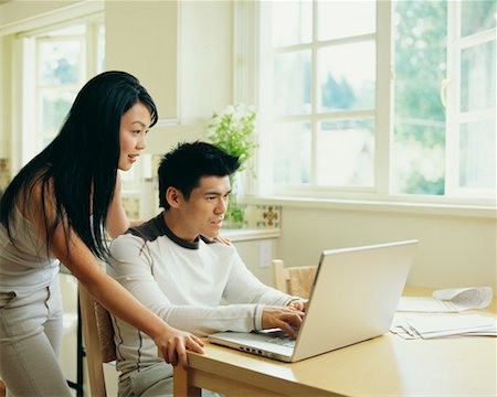 simsearch:700-00609240,k - Couple Using Laptop Stock Photo - Rights-Managed, Code: 700-00609235