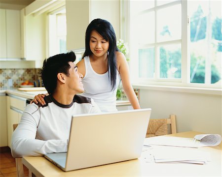 simsearch:700-00688680,k - Couple Using Laptop Stock Photo - Rights-Managed, Code: 700-00609233