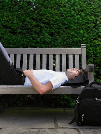 Man Lying Down on Park Bench Stock Photo - Rights-Managed, Code: 700-00609888