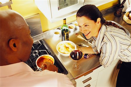 simsearch:600-02912202,k - Couple Cooking at Home Stock Photo - Rights-Managed, Code: 700-00609968