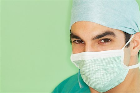 simsearch:700-02264741,k - Close-up Portrait of Man Wearing Surgical Mask Stock Photo - Rights-Managed, Code: 700-00603456
