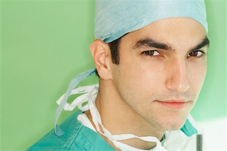simsearch:700-02264741,k - Close-up Portrait of Man Wearing Surgeon's Uniform Stock Photo - Rights-Managed, Code: 700-00603458
