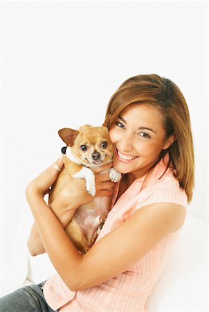 simsearch:700-03814393,k - Portrait of Woman Holding Dog Stock Photo - Rights-Managed, Code: 700-00617294