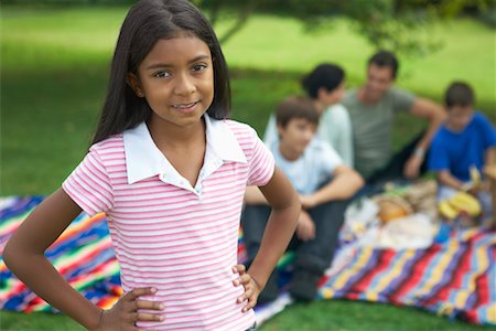 simsearch:700-00073572,k - Portrait of Girl, Family Having Picnic in Background Stock Photo - Rights-Managed, Code: 700-00617629