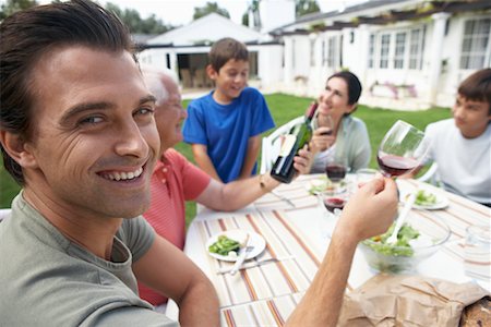 simsearch:6115-08101366,k - Family Eating Outdoors Stock Photo - Rights-Managed, Code: 700-00617632