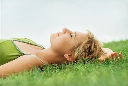 simsearch:700-00522867,k - Woman Lying on Grass Stock Photo - Rights-Managed, Code: 700-00618092