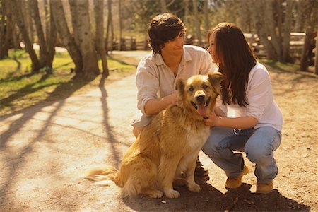 simsearch:841-02720357,k - Portrait Of A Couple And Dog On A Country Road Stock Photo - Rights-Managed, Code: 700-00618684