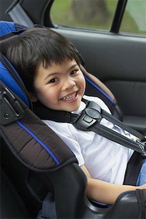 simsearch:700-07311591,k - Portrait of Boy in Car Seat Stock Photo - Rights-Managed, Code: 700-00610444