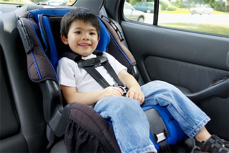 simsearch:700-07311591,k - Portrait of Boy in Car Seat Stock Photo - Rights-Managed, Code: 700-00610445