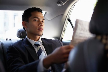 filipino (male) - Businessman Reading News Paper Stock Photo - Rights-Managed, Code: 700-00610872