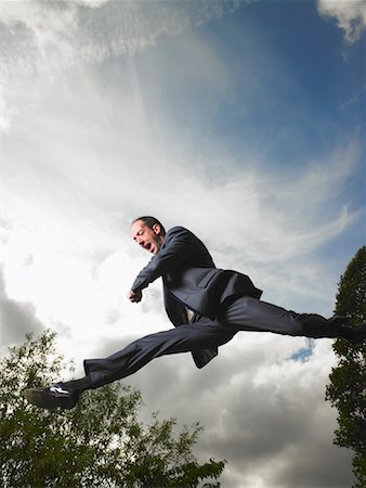 Businessman Jumping in Air Stock Photo - Rights-Managed, Code: 700-00611240