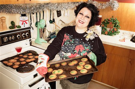 simsearch:6108-05869331,k - Woman Baking Christmas Cookies Stock Photo - Rights-Managed, Code: 700-00620332