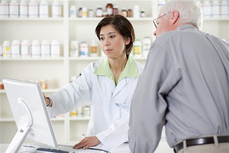 pharmacy purchase - Pharmacist Helping Customer Stock Photo - Rights-Managed, Code: 700-00623058