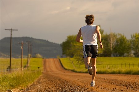 rolling hills train - Man Running On Dirt Road, Boulder, Colorado, USA Stock Photo - Rights-Managed, Code: 700-00634175