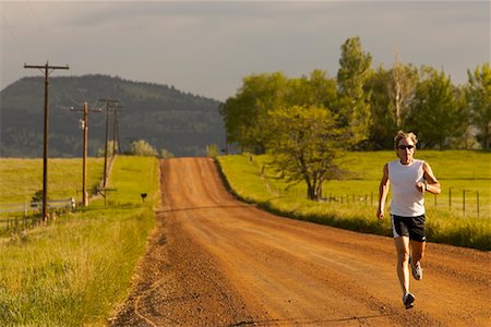 rolling hills train - Man Running On Dirt Road, Boulder, Colorado, USA Stock Photo - Rights-Managed, Code: 700-00634177