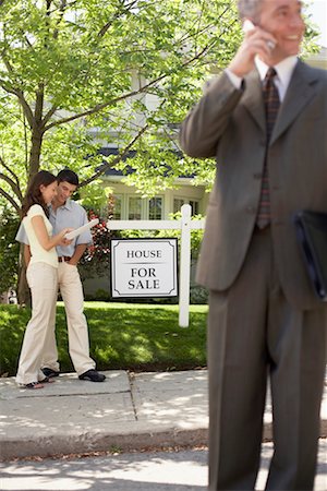 Couple with Realtor Stock Photo - Rights-Managed, Code: 700-00634392