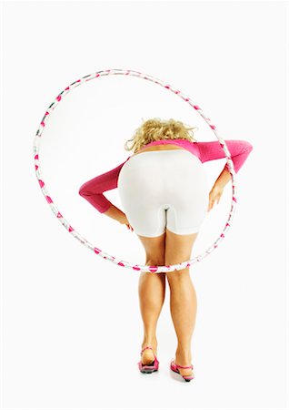 simsearch:700-01112521,k - Woman Bent Over, Twirling Hula-Hoop Stock Photo - Rights-Managed, Code: 700-00635585