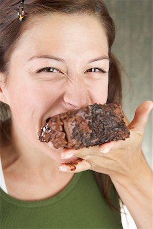 simsearch:614-06537664,k - Woman Eating Chocolate Cake Stock Photo - Rights-Managed, Code: 700-00635824