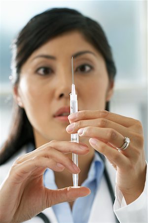 simsearch:700-00639454,k - Doctor with Syringe Stock Photo - Rights-Managed, Code: 700-00639407