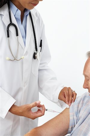 simsearch:600-02912811,k - Doctor with Patient Stock Photo - Rights-Managed, Code: 700-00639409