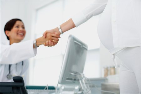 simsearch:700-00639454,k - Doctor Shaking Hands with Patient Stock Photo - Rights-Managed, Code: 700-00639444