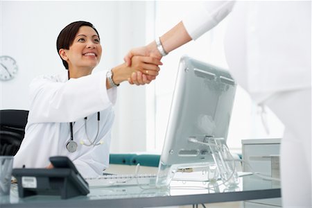 simsearch:700-00639454,k - Doctor Shaking Hands with Patient Stock Photo - Rights-Managed, Code: 700-00639443
