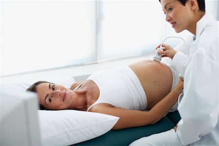 fertility clinic - Doctor Performing Ultrasound Stock Photo - Rights-Managed, Code: 700-00639475